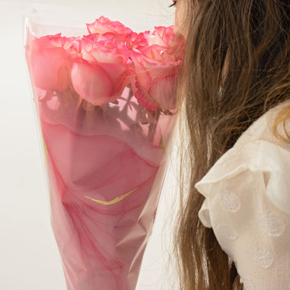 Smelling fresh roses in Ink Stories Sleeve Pink